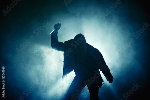 Bilde på lerret Silhouette Hand Hooligan Nebel blau Messer