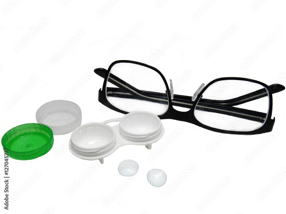 Glasses and contact lenses container on white background