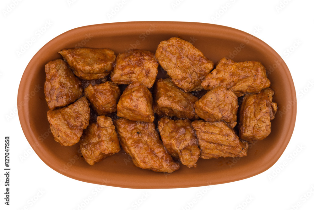 Stew in a brown plate. (Goulash) isolated on white background. Stew in a brown plate. (Goulash) isolated on white background.