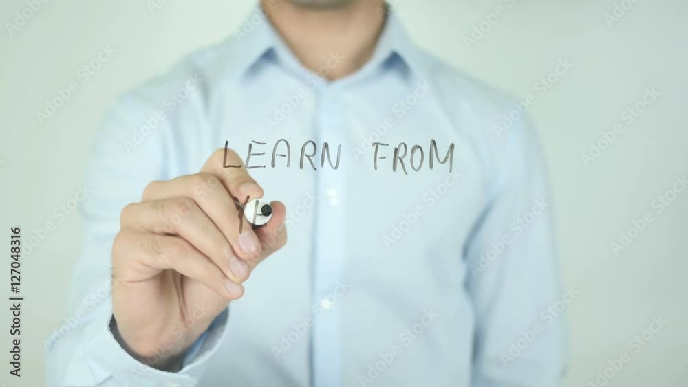 Learn From Yesterday, Man Writing on Screen Learn From Yesterday, Man Writing on Screen