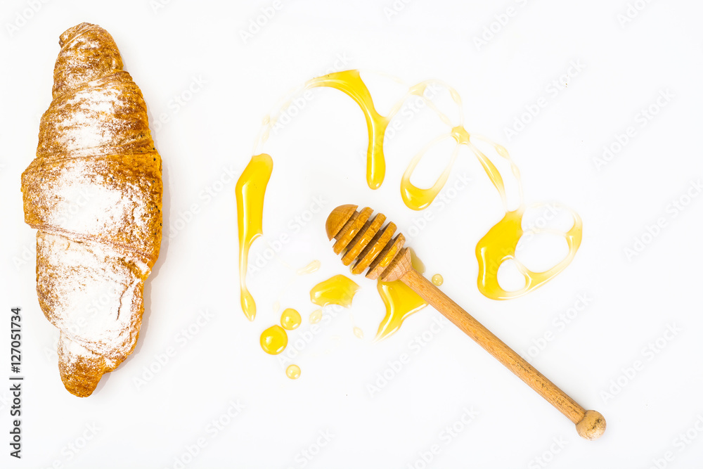 Honey dipper and fragrant into a bowl Honey dipper and fragrant into a bowl