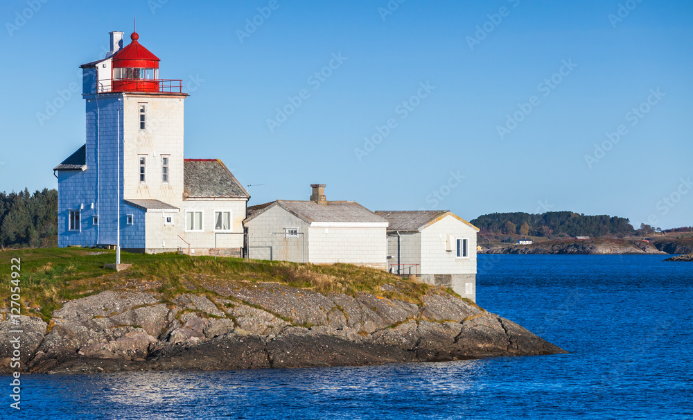 Lighthouse, white tower with red top. Norway