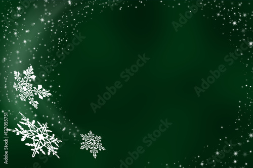 Flying snowflakes on green background - abstract