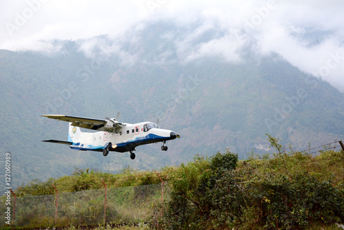 Wallpaper Mural The aircraft on the runway of the Tenzing-Hillary airport Lukla - Nepal, Himalayas. Torontodigital.ca