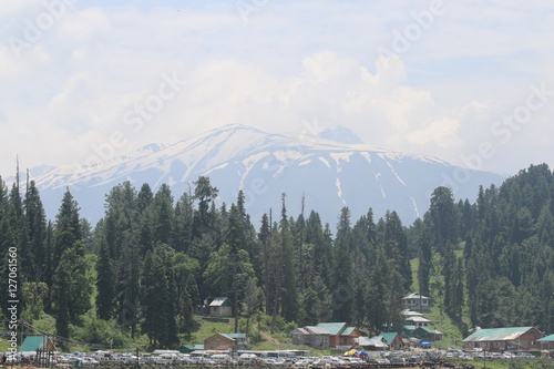 Beautiful view of Gulmarg, mountains, green tree line of Jammu & Kashmir valley. photo