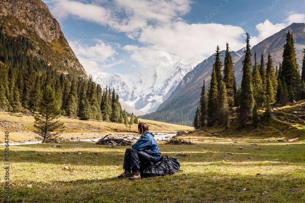 Hiker relaxing at mountains, Tien Shan