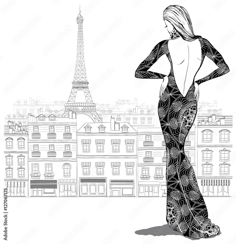 Fashion woman model in a beautiful dress on Paris city backgroun