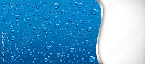 water drops on blue background with place for text