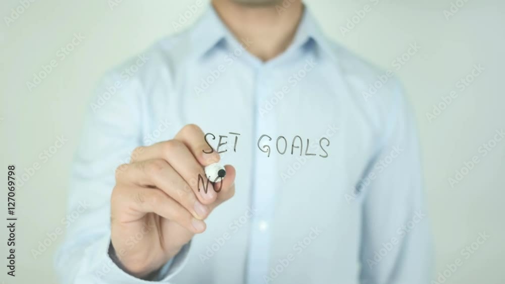 Set Goals Not Limits, Man Writing on Screen Set Goals Not Limits, Man Writing on Screen
