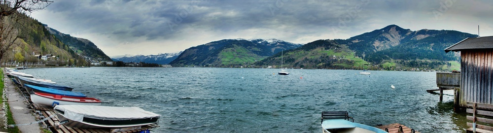 Lake panorama in alps with boat