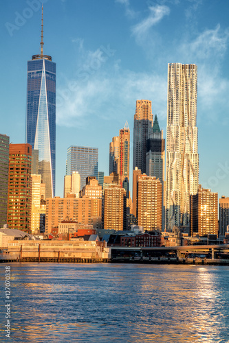 Office Buildings in Manhattan from river  New York City  USA