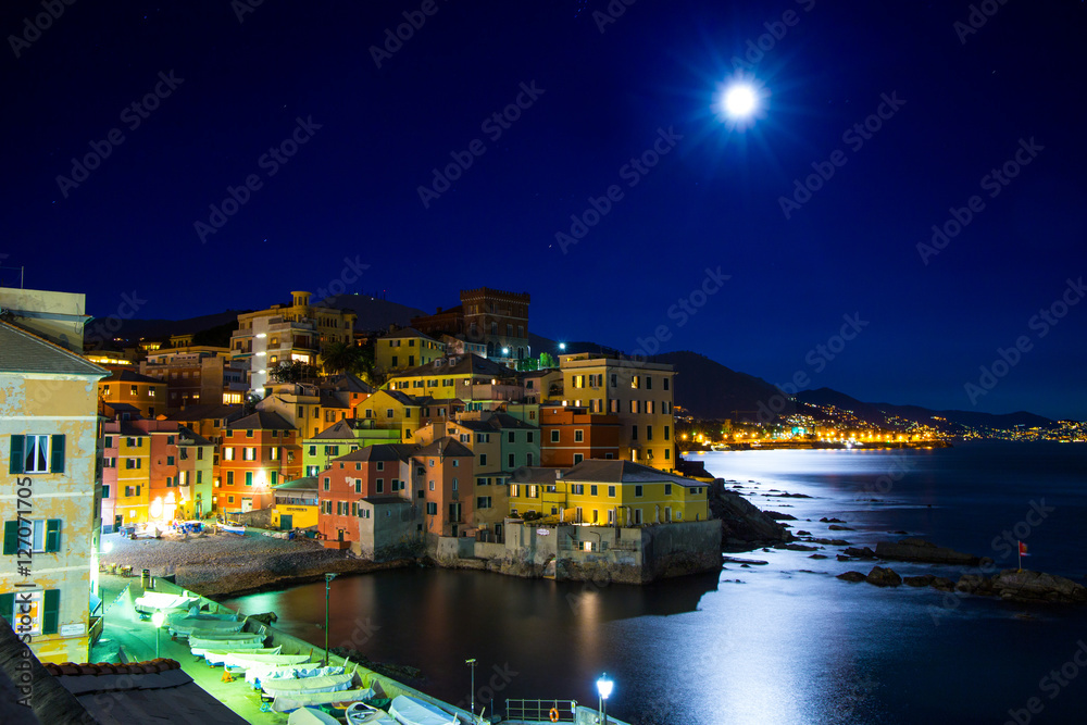 GENOA, ITALY NOVEMBER 14, 2016 - Genoa Boccadasse by night while watching the large moon of November 14, 2016 in Genoa, Italy, Europe