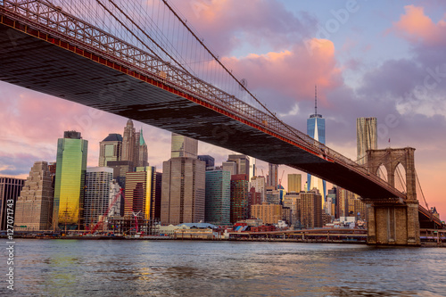 Sunrise colors of Brooklyn Bridge and Manhattan in New York City