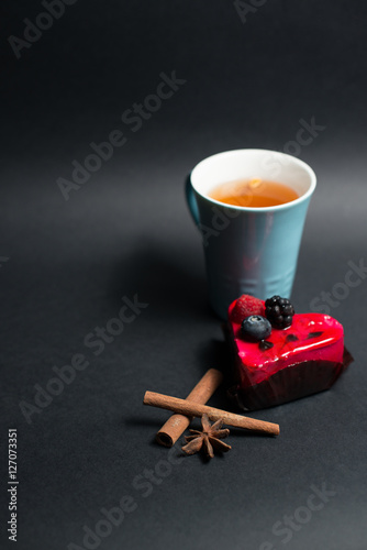 Cup of Tea, Cake on a black background