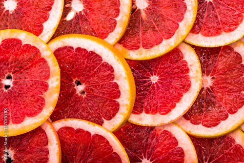 Close-up of sliced grapefruit, background, citrus natural texture