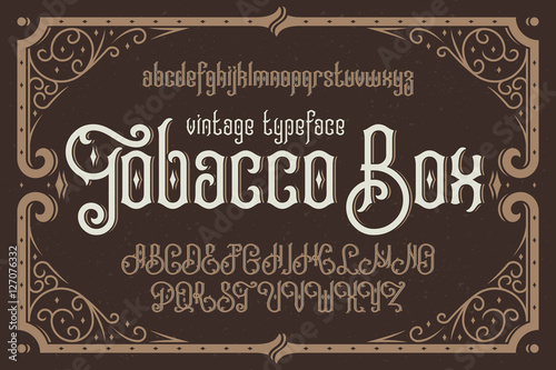 Vintage vector typeface named "Tobacco Box" with a beautiful dec