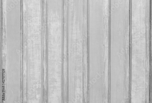 Closeup surface wood pattern at old wood board at the fence of house textured background in black and white tone
