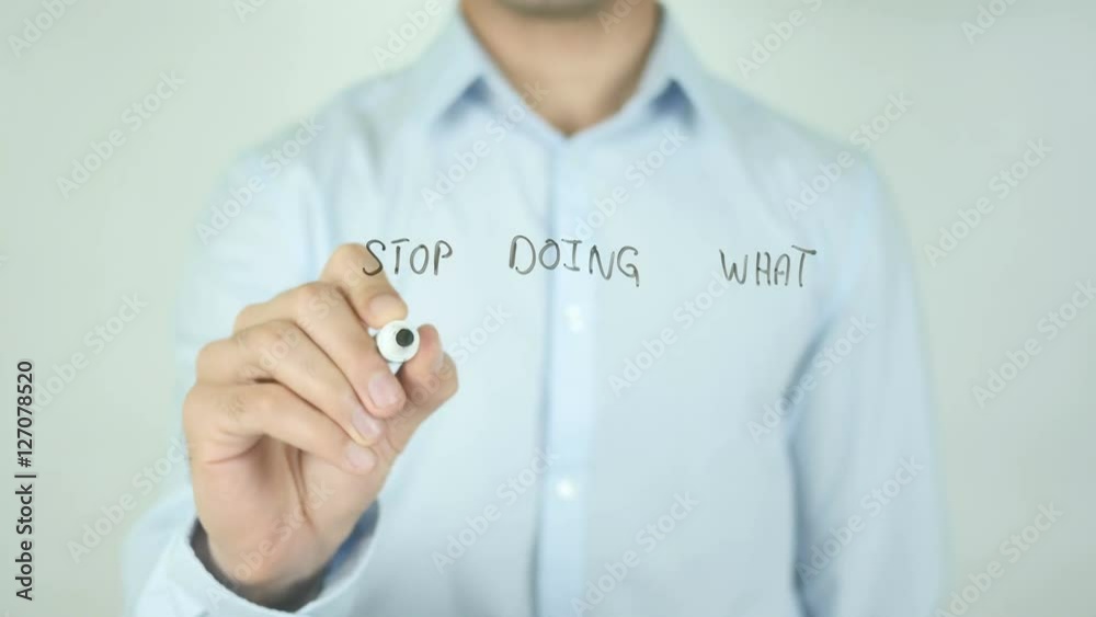 Stop Doing What Doesn't Work, Man Writing on Screen