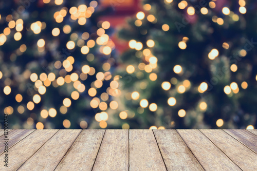 Christmas holiday background with empty wooden table photo