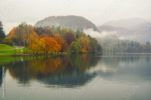 Scenic view of colorful trees reflected in lake water