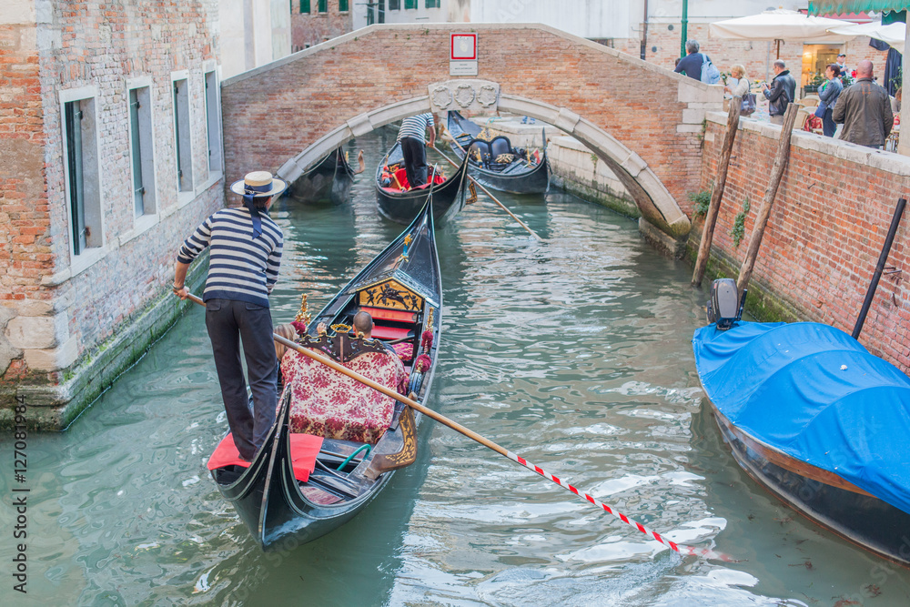 People in Venice gondolas