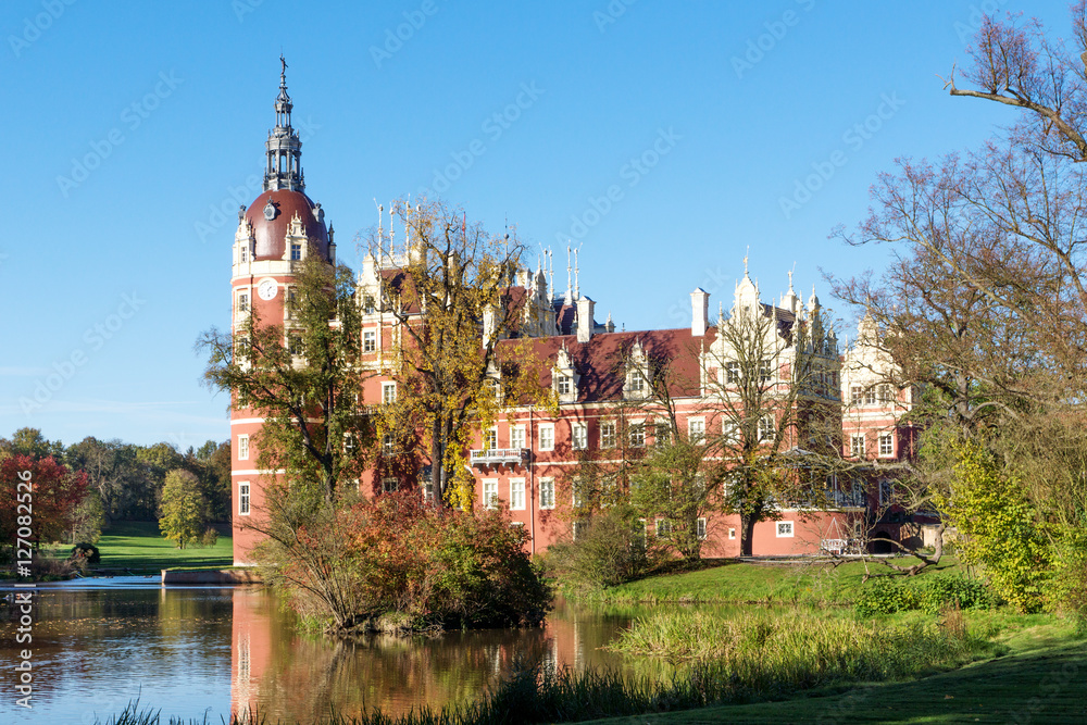 Muskau Palace reflected in the lake in the Lusatia, Germany Muskau Palace reflected in the lake in the Lusatia, Germany