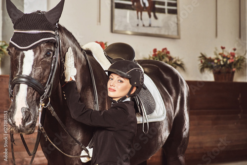 woman jockey with his horse © nazarovsergey