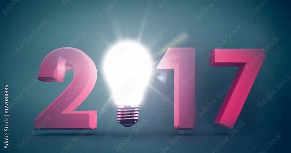 Composite image of 2017 with glowing light bulb over white backg Composite image of 2017 with glowing light bulb over white backg