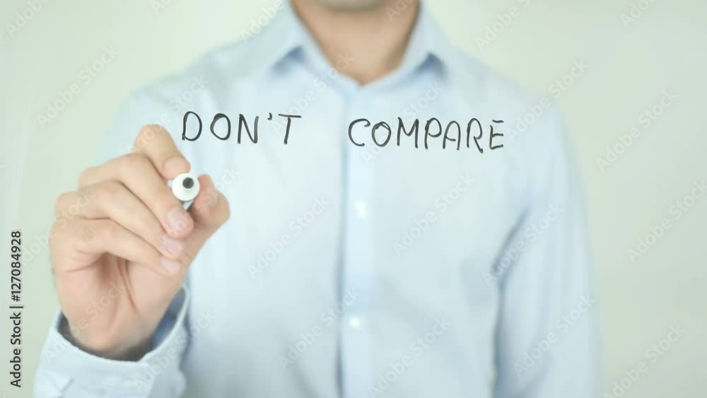 Don't Compare Yourself With Others , Man Writing on Screen Don't Compare Yourself With Others , Man Writing on Screen