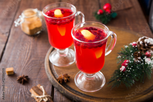 Christmas card. hot spicy Christmas drink of cranberry and spice