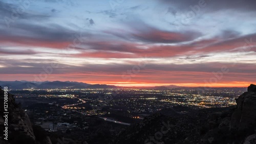 Los Angeles San Fernando Valley mountain view sunrise time lapse with zoom in.  Shot from Rocky Peak Park in the Santa Susana Mountains in Southern California. photo