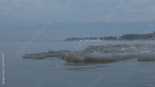 View of steaming water waves in frosty day. Baltic sea.