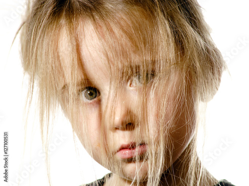 фотографія Disheveled preschooler girl with long hair portrait