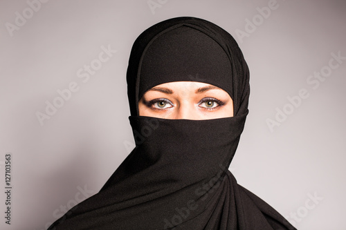 Fotografie Beautiful Muslim girl wearing burqa closeup