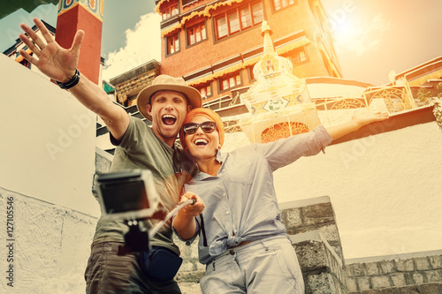 Photography Happy couple take a self photo on the tibetian sight background