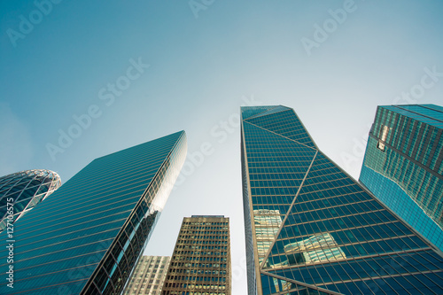 Skyscrapers with glass facade. Modern buildings in Paris business district. Concepts of economics  financial  future.  Copy space for text. Dynamic composition