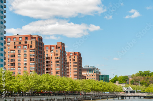Modern apartment buildings exteriors in sunny day in new york