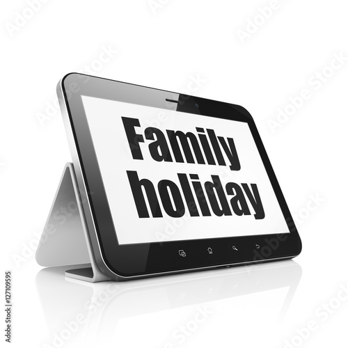 Vacation concept: Tablet Computer with Family Holiday on display