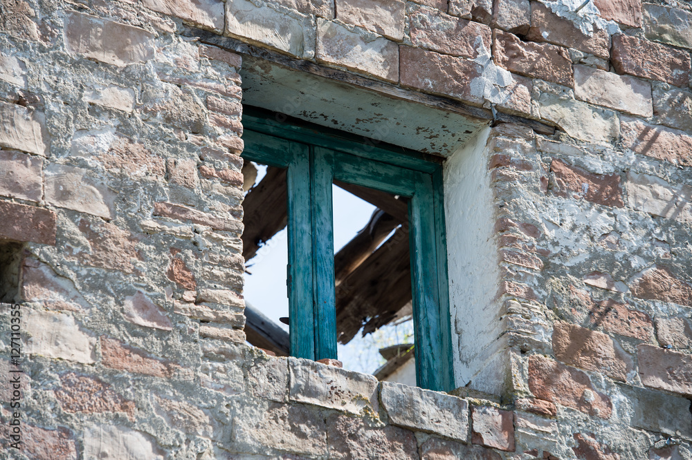 old window destroyed with roof broke