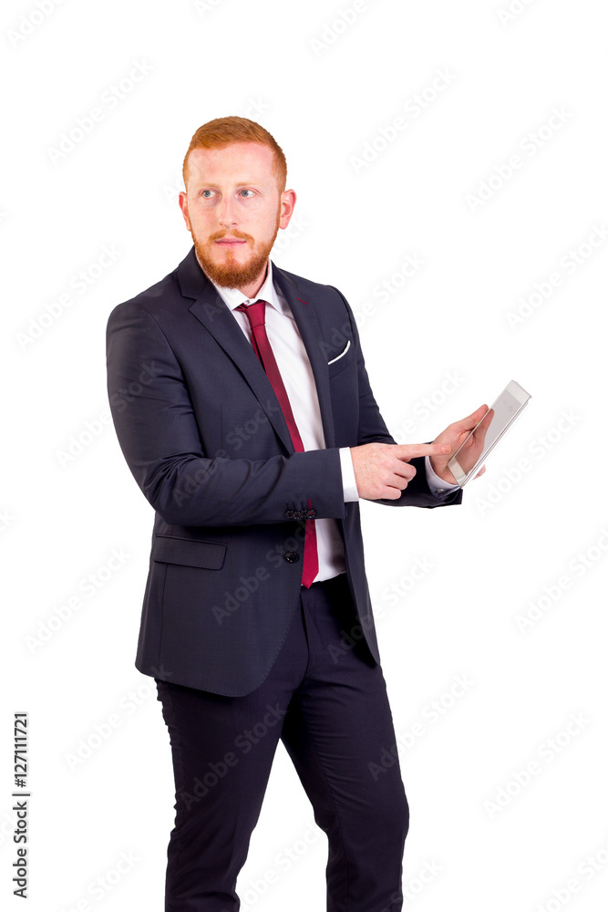 Executive redhead with tablet Executive redhead with tablet