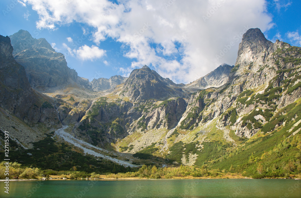 High Tatras - The Zelene Pleso lake and valley with the Pysny peak and Jastrabia tower and other peaks.