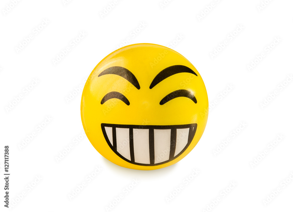 Fototapeta premium Laughing emoticon toy ball isolated over white.