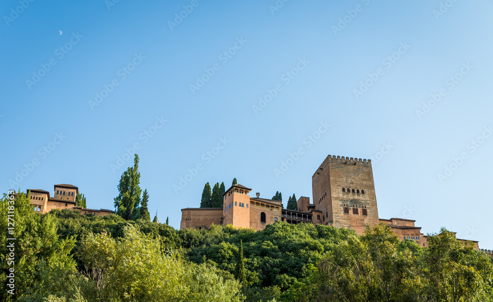Granada - The Alhambra palace and fortness complex in evening light.