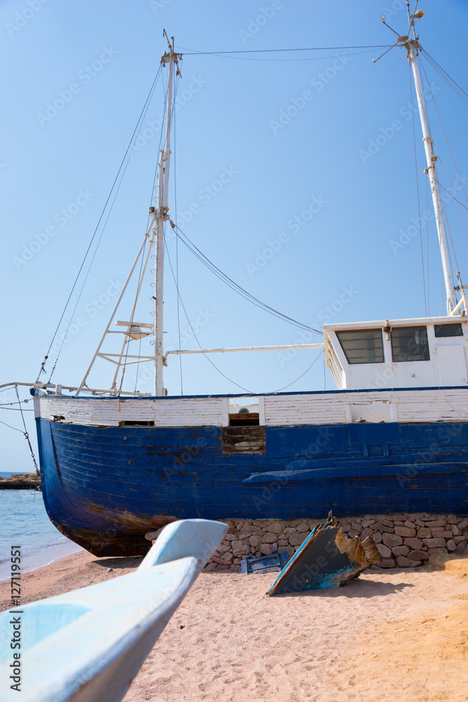 Old ship on the seashore
