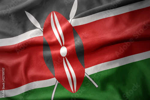 waving colorful flag of kenya. photo