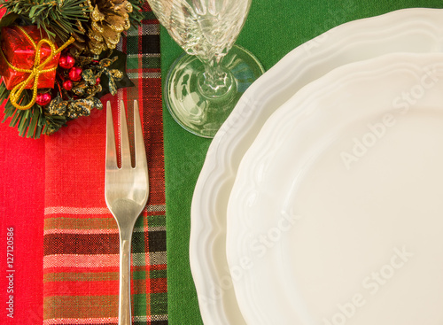 Festive table setting with Christmas decorations.