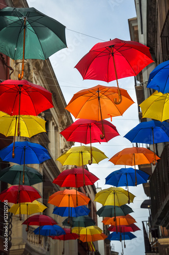 Street decorated with colored umbrellas.