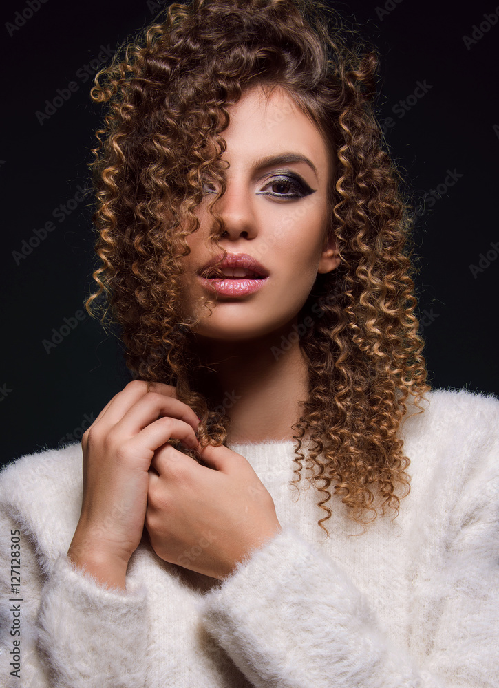 Beautiful girl with curly hair and make up '60s Stock Photo | Adobe Stock