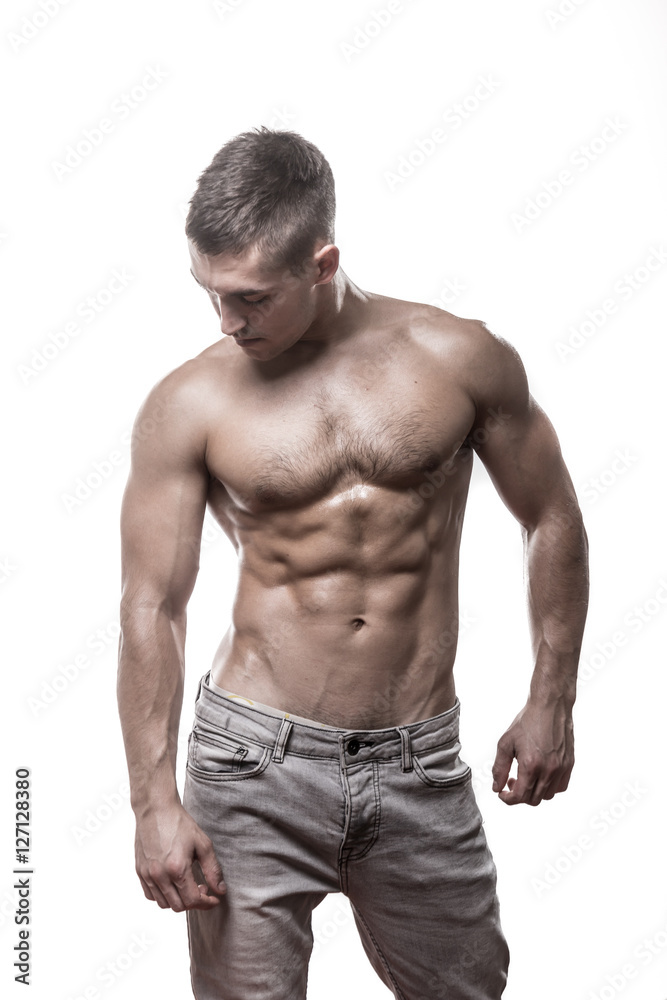 young man bodybuilder white isolated background. young man bodybuilder white isolated background.