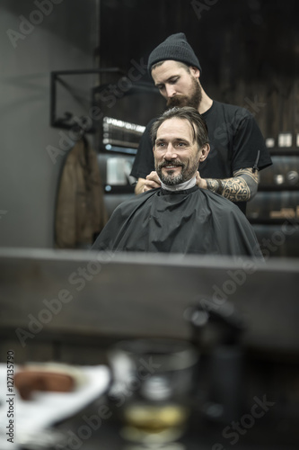 Stylish man in barbershop